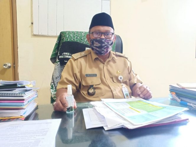 
					Lurah Baktijaya, Raden Iwan. (Foto: Diskominfo)