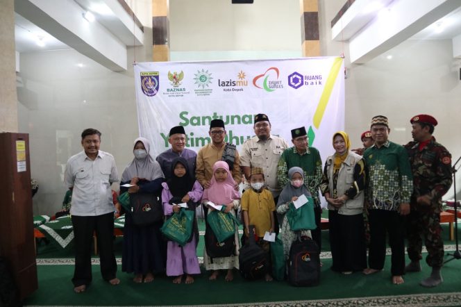 
					<strong>Ratusan Anak Yatim Terima Santunan Paket Sekolah dan Uang Tunai</strong>