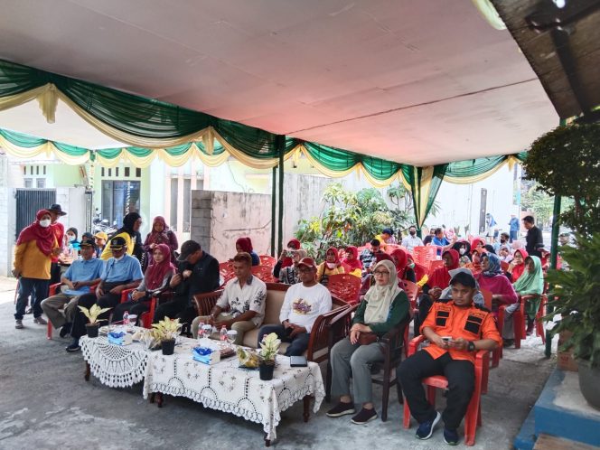
					<em>Peresmian Taman Bacaan Masyarakat (TBM) Teratai Lentera Dunia</em>